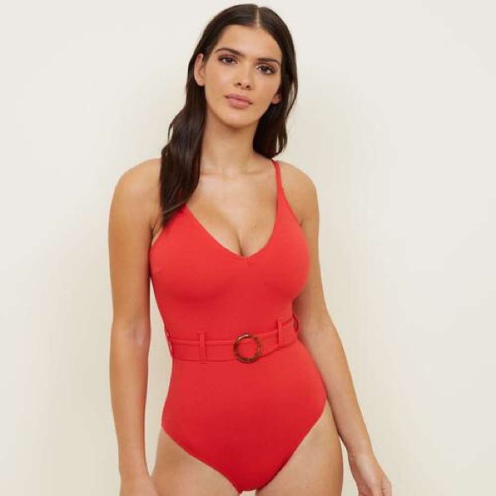 Red one piece belted swimsuit.
